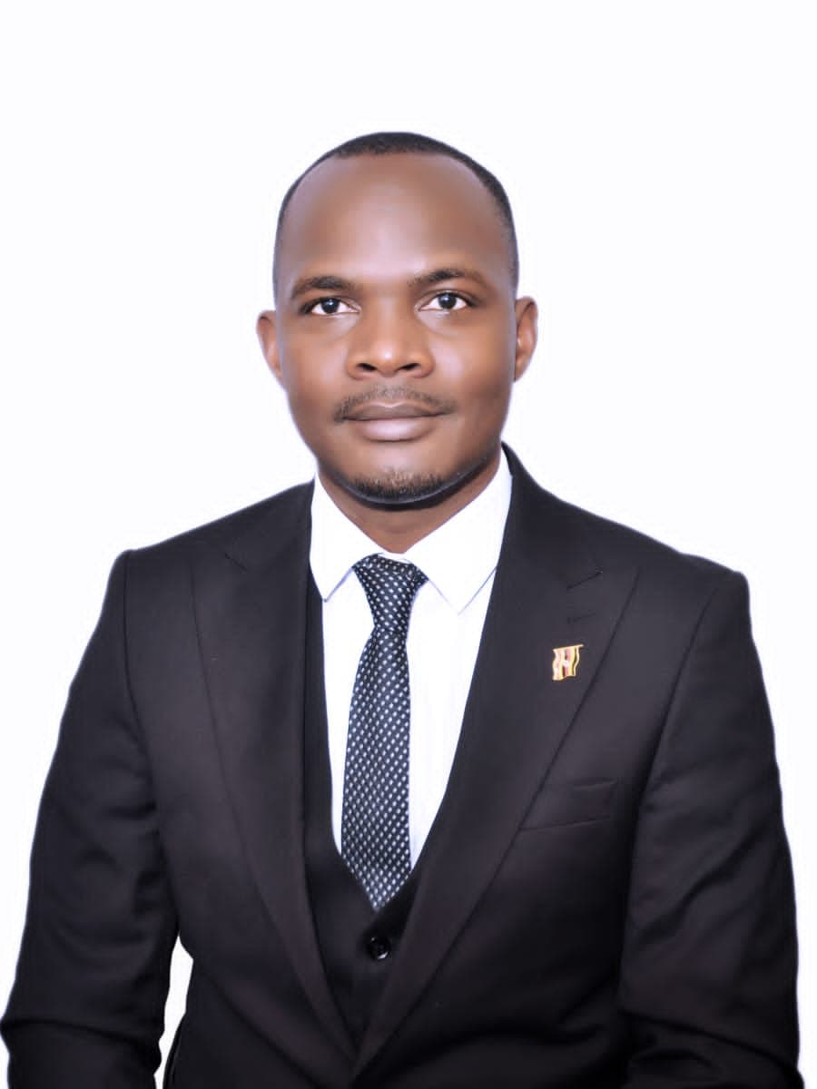 Oweng. Bamuturaki Julius — Minister for ICT, Research and Documentation